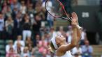 Petenis Russia, Elena Vesnina meluapkan kegembiraan usai mengalahkan petenis Slovakia, Dominika Cibulkova 6-2, 6-2 pada babak perempat final Tenis Wimbledon Championships 2016 di The All England Lawn Tennis Club, Wimbledon, (5/7/2016). (AFP/Justin Tallis)