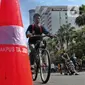 Warga bersepeda saat Car Free Day di Kawasan Bundaran HI, Jakarta, Minggu (4/9/2022). Pemerintah Provinsi DKI Jakarta akan memiliki jalur sepeda hingga 309,5 kilometer. (Liputan6.com/Angga Yuniar)
