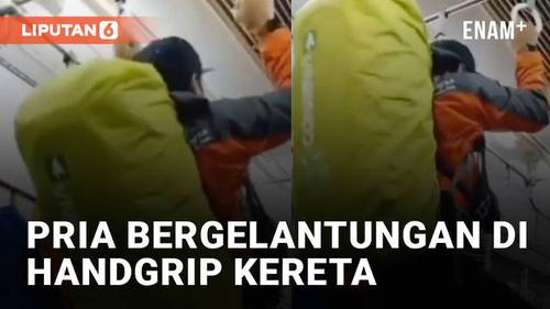 VIDEO: Bergelantungan di Handgrip Kereta, Aksi Pria Ini Tuai Hujatan Netizen