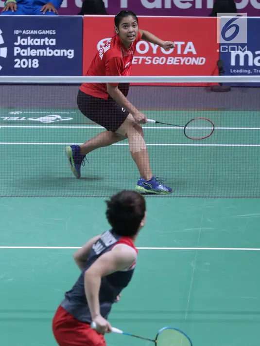 Tunggal putri Indonesia, Gregoria Mariska Tunjung saat melawan pemain Jepang, Akana Yamaguchi pada semifinal Bulutangkis Beregu Putri Asian Games 2018 di Jakarta, Selasa (21/8). (Liputan6.com/Helmi Fithriansyah)