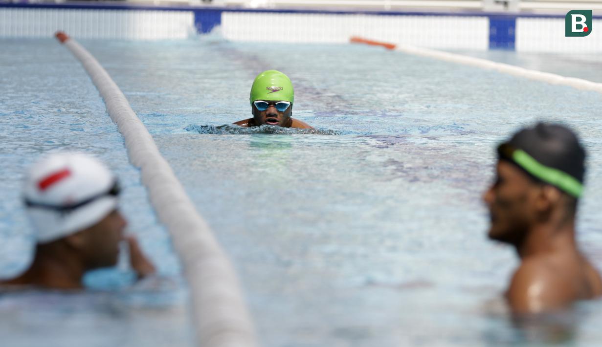 Atlet renang Asian Para Games Indonesia, melakukan latihan di Stadion Akuatik, GBK, Jakarta, Jumat (05/10/2018). Latihan tersebut juga dalam rangka adaptasi kolam renang jelang pertandingan. (Bola.com/M Iqbal Ichsan)