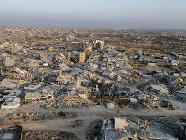 Foto udara ini menunjukkan bangunan-bangunan yang hancur di kawasan Al-Remal, Kota Gaza, pada 23 Oktober 2025. (Foto oleh AFP)