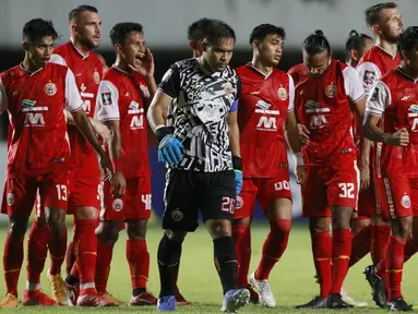 Pemain Persija Jakarta merayakan kemenangan usai mengalahkan Persib Bandung pada laga final Piala Menpora 2021 di Stadion Maguwoharjo, Sleman, Kamis (22/4/2021). Persija menang dengan skor 2-0. (Bola.com/M Iqbal Ichsan)