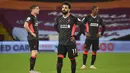 Striker Liverpool, Mohamed Salah, tampak kecewa usai ditaklukkan Aston Villa pada laga Liga Inggris di Stadion Villa Park, Minggu (4/10/2020). Liverpool takluk dengan skor 7-2. (Peter Powell/Pool via AP)
