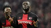 Striker Nigeria berusia 23 tahun, Victor Boniface didatangkan Bayer Leverkusen dari klub Belgia, Union SG dengan nilai transfer 20,5 juta euro dengan durasi kontrak selama 5 tahun hingga akhir musim 2027/2028. Telah bermain dalam 23 laga di semua kompetisi, ia telah mencetak 16 gol dan 8 assist, sepuluh gol di antaranya dicetak di ajang Bundesliga. (AFP/Ina Fassbender)