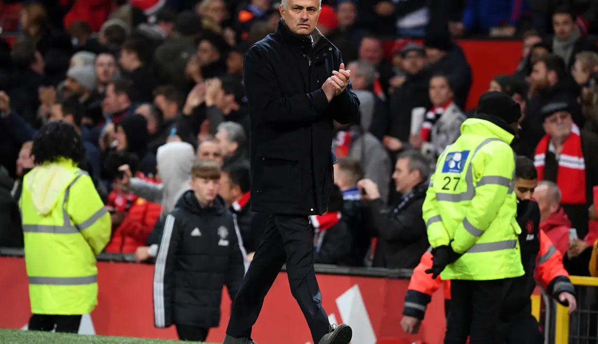 Pekerjaan sebagai pelatih adalah impian pelatih berkebangsaan Portugal tersebut. Dengan begitu jangan menguji lagi kesetiaan Mourinho bersama Manchester United. (AFP/Paul Ellis)