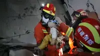 Anak Bayi Selamat dari Reruntuhan Hotel Karantina Virus Corona di China