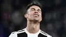 8. Ekspresi Cristiano Ronaldo saat gagal membobol gawang Atletico Madrid pada pertandingan 16 besar Liga Champions. (AFP/Marco Bertorello)