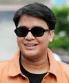 Presenter Billy Syahputra merasa senang bisa berbagi kebahagiaan pada banyak orang di mana saja. Terlebih bila membawa semangat meraih kemenangan dari program Siapa Mau Jadi Juara. [Foto: Bambang E Ros/Fimela.com]