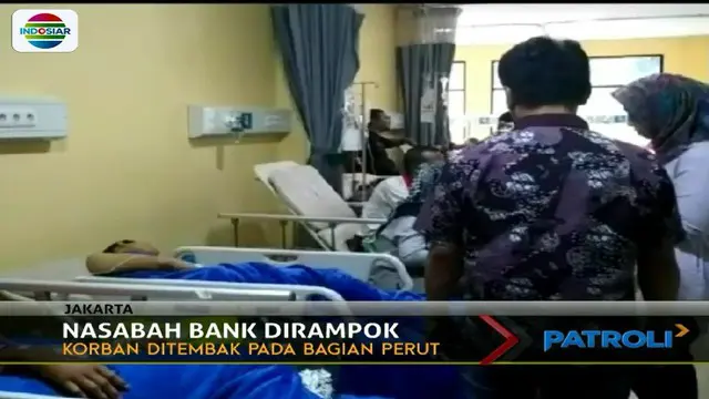 Nasabah Bank JadSeorang nasabah bank menjadi korban perampokan di Kawasan Ciracas, Jakarta Timur.i Korban Perampokan di Ciracas (Patroli Siang)