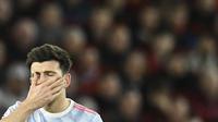 Harry Maguire lagi-lagi menjadi biang kerok kekalahan Manchester United dari Liverpool. Kebobolan empat bukti begitu rapuhnya pertahanan Setan Merah yang dikomandoi sang kapten tersebut. (AFP/Oli Scarff)