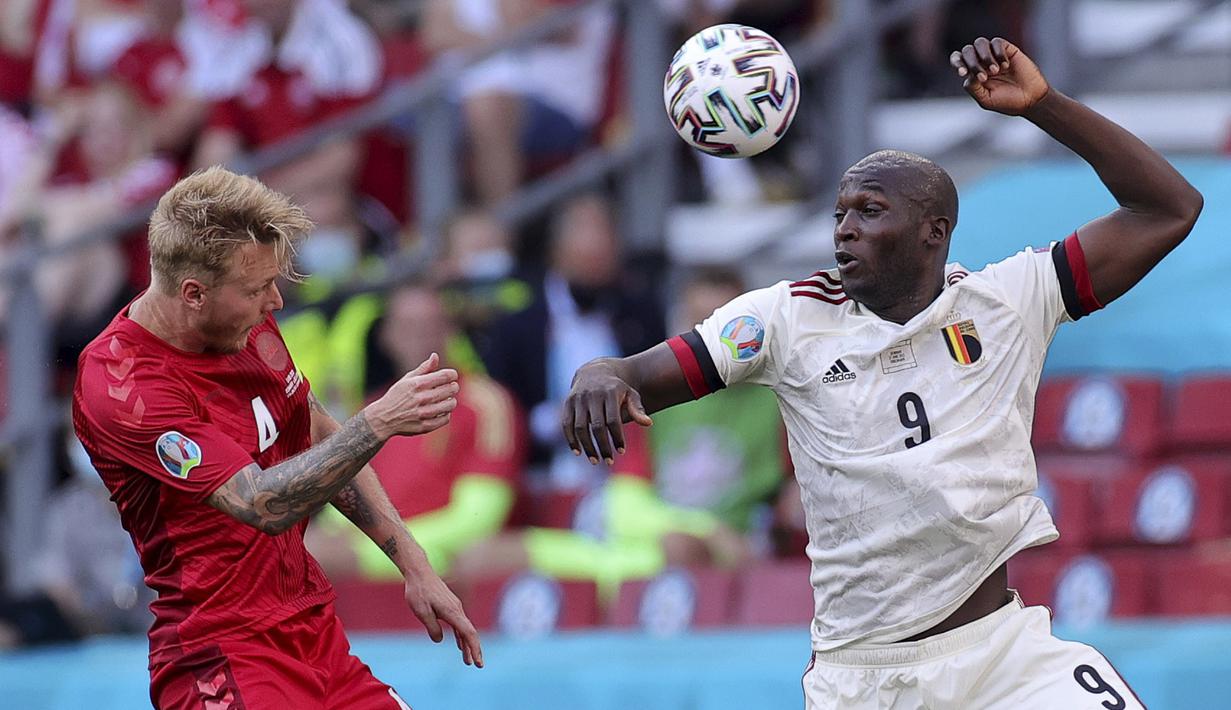 Belgia seharusnya punya komposisi pemain lebih baik, tapi permainan mereka belum terbentuk hingga menit ke-30. Tempo permainan Romelu Lukaku dkk. masih kacau. (Foto: AP/Pool/Friedemann Vogel)