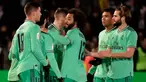 Pemain Real Madrid merayakan gol rekan setimnya, Brahim Diaz ke gawang Unionistas de Salamanca pada pertandingan babak ke-32 besar Copa del Rey 2019-2020 di Pistas del Helmantico, Rabu (22/1/2020). Madrid harus berjuang keras untuk menang 3-1 atas tim divisi tiga, Unionistas. (JAVIER SORIANO/AFP)