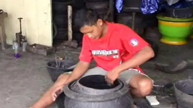 Ban Bekas Disulap Jadi Pot Bunga