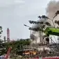 Tangkap layar video kebakaran di area Kilang Pertamina Internasional Balikpapan pada Minggu (15/5/2022). (Liputan6.com/Istimewa)