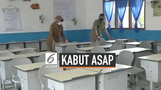 Sejumlah sekolah di Kota Palembang meliburkan siswanya, Senin (23/9/2019) pagi. Kebijakan ini diambil akibat kabut asap semakin pekat di Kota Palembang.