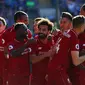 Selebrasi pemain Liverpool dari gol yang dicetak Wijnadum pada laga lanjutan Premier League yang berlangsung di Stadion Millenium, Cardiff, Minggu (21/4). Liverpool menang 2-0 atas Cardiff City. (AFP/Geoff Caddick)