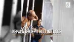 Entah apa yang dilakukan kakek ini sampai-sampai kepalanya terjepit rolling door.