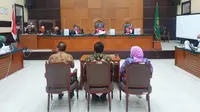 Kiri-Kanan: Pengadilan Negeri (PN) Jakarta Timur menghadirkan ketiga terdakwa Djoko Tjandra, Anita Dewi Kolopaking, dan Brigjen Prasetijo Utomo, Jumat (27/11/2020). (Merdeka/Bachtiarudin Alam)