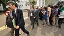 Presiden Japan International Cooperation Agency (JICA) Akihiko Tanaka meninggalkan Istana Negara usai menemui Presiden Joko Widodo, Jakarta, Kamis (12/2/2015). (Liputan6.com/Faizal Fanani)