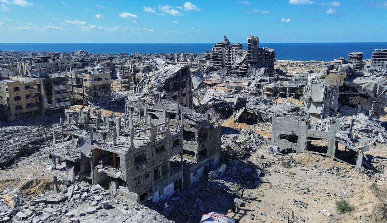 Sementara, Biro Pusat Statistik Palestina (PCBS) melaporkan jumlah bangunan yang rusak akibat agresi Israel di Jalur Gaza sejak Oktober 2023 hingga September 2025 mencapai 190.115 bangunan, termasuk 102.067 yang hancur total. (AP Photo)