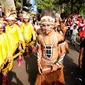 Perwakilan pelajar dan mahasiswa Papua mengikuti Kirab Kebangsaan Indonesia Raya di Cibinong, Kab Bogor, Minggu (14/5). Kirab diikuti puluhan organisasi kepemudaan se Kabupaten Bogor. (Liputan6.com/Helmi Fithriansyah)