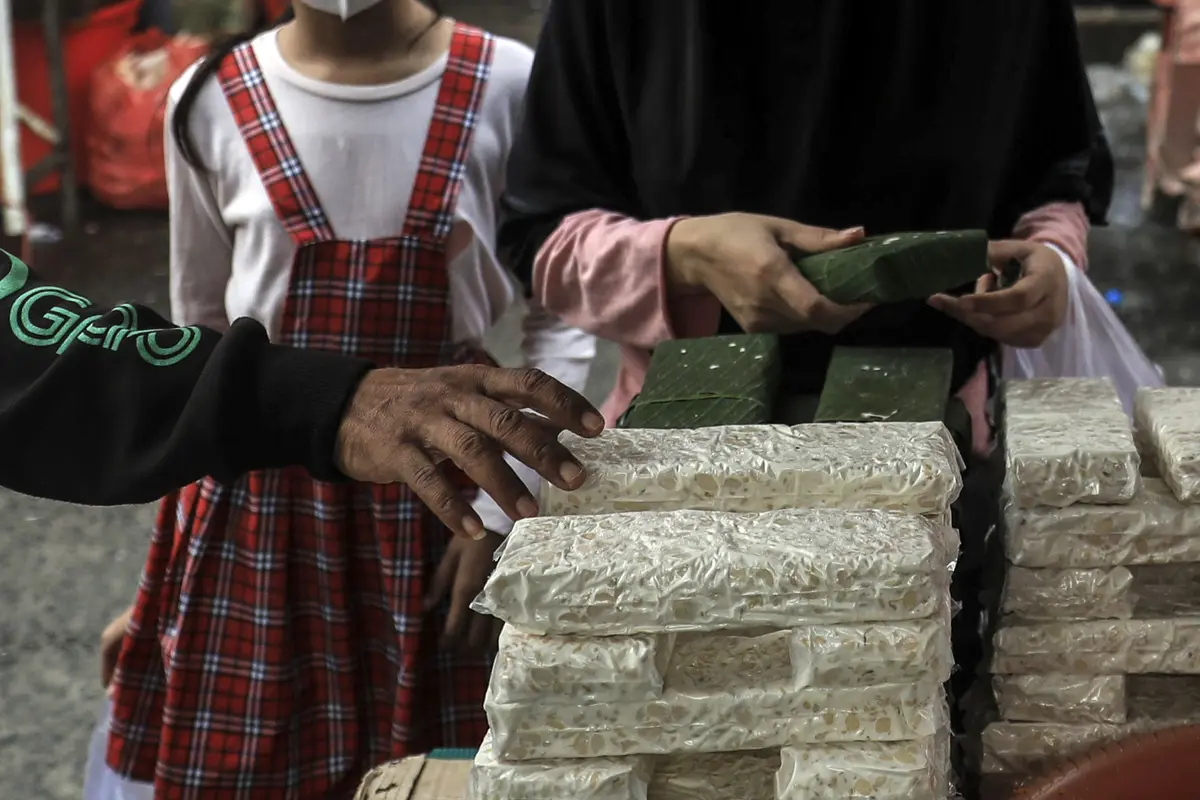 FOTO: Harga Kedelai Naik, Pengusaha Tahu Tempe Bakal Mogok Produksi