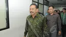 Tersangka kasus dugaan suap Hakim MK terkait Pilkada Kabupaten Tapanuli Tengah tahun 2011, Raja Bonaran Situmeang seusai menjalani sidang perdana di Pengadilan Tipikor, Jakarta, Kamis (23/2/2015). (Liputan6.com/Herman Zakharia)