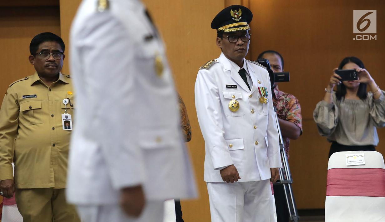 Ekspresi Bupati Tulungagung terpilih hasil Pilkada 2018, Syahri Mulyo saat menghadiri pelantikan di Jakarta, Selasa (25/9). Syahri dinonaktifkan sebagai Bupati Tulungagung karena berstatus tahanan KPK. (Merdeka.com/Imam Buhori)