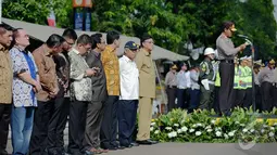  Sejumlah pejabat saat menghadiri apel Operasi Lilin 2014, Jakarta,(23/12/2014).  (Liputan6.com /Faizal Fanani)