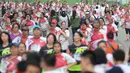 Sebanyak 5.600 peserta mengikuti acara lomba lari Joyful Run 2017 di Alam Sutera, Tangerang Selatan, Minggu (7/5). Acara tersebut diselenggarakan sebagai pre-event Asian Youth Day di Yogyakarta. (Liputan6.com/Helmi Afandi)