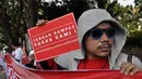Aksi tolak Pilkada melalui DPRD di seberang Istana Merdeka, Jakarta, (16/8/14). (Liputan6.com/Miftahul Hayat)