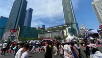 Suasana di sekitar Bundaran Hotel Indonesia (HI) saat pelantikan Presiden-Wakil Presiden RI. (Liputan6.com/Hisyam)