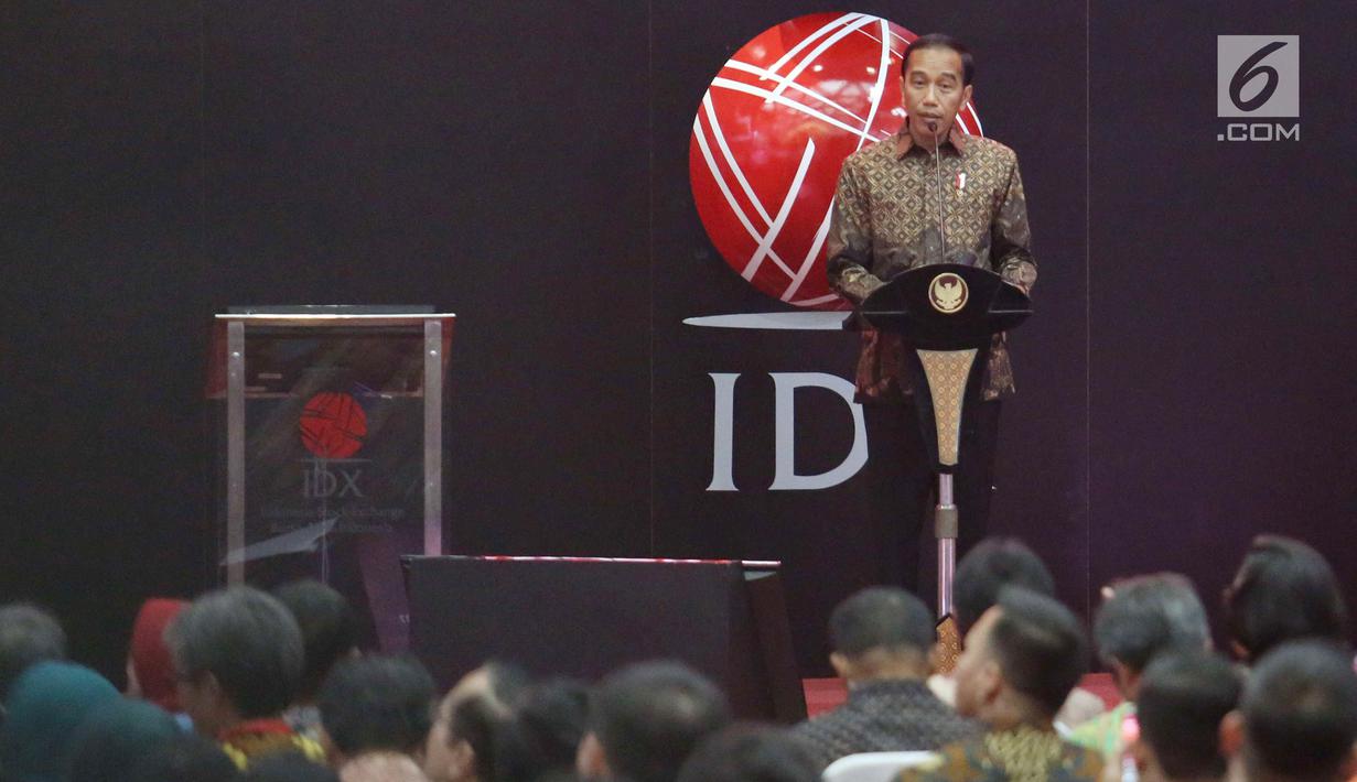 Presiden Joko Widodo memberikan sambutan pada penutupan index saham gabungan 2017 di BEI, Jakarta, Jumat (29/12). Perdagangan bursa saham 2017 ditutup pada level 6.355,65 poin, angka tersebut naik dibandingkan tahun 2016. (Liputan6.com/Angga Yuniar)