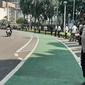 Jelang Parade Pembalap MotoGP, Kawasan Bundaran HI Dijaga Personel Gabungan. (Liputan6.com/Ady Anugrahadi)