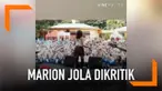 Mengaku kepanasan, Marion Jola membuka jaketnya tepat di hadapan siswa SMA dan tampil dengan tanktop putih. Aksinya itu disusul oleh teriakan histeris para siswa.