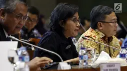 Menteri Keuangan Sri Mulyani saat mengikuti rapat kerja bersama Komisi XI, di Kompleks Parlemen, Senayan, Jakarta, Rabu (16/1). Rapat kerja beragendakan membahas perekonomian tahun 2019.( Liputan6.com/JohanTallo)