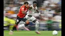 Real Madrid cuma menyanggupi gaji 20 juta euro per tahun atau sekitar Rp 360 miliar, tanpa adanya bonus. Sementara itu, agen Vinicius meminta tambahan bonus 10 juta euro. (AFP/Javier Soriano)