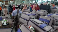 Warga yang hendak berangkat umrah di Bandara Soekarno Hatta, Kamis (27/2/2020). (Liputan6.com/ Pramita Tristiawati)