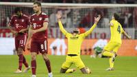 Bayern Munchen secara mengejutkan terdepak dari Liga Champions musim ini usai hanya mampu bermain imbang 1-1 melawan Villarreal pada leg kedua perempat final di Allianz Arena, Rabu (13/04/2022). (AP/Matthias Schrader)