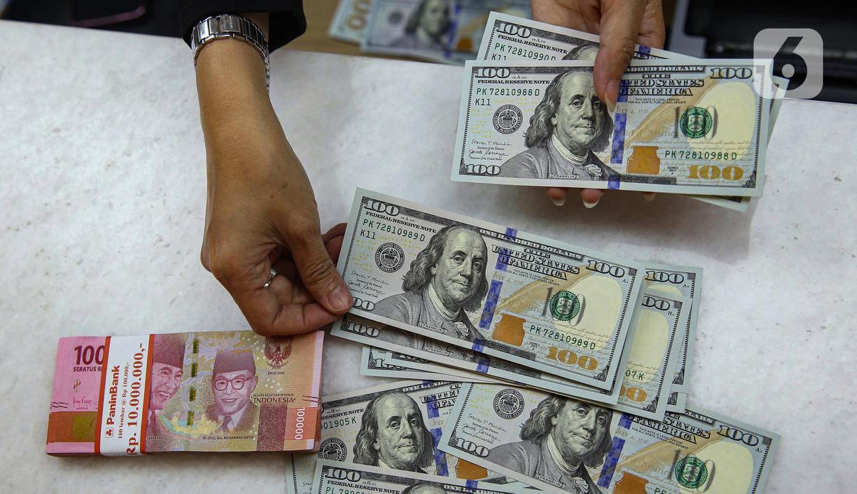 Selain rupiah, pada penutupan perdagangan, Senin (13/1/2025), Indeks Harga Saham Gabungan (IHSG) berakhir di zona merah. (Liputan6.com/Angga Yuniar)