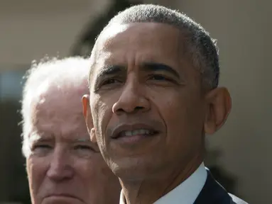 Presiden AS Barack Obama memberikan pidato kemenangan Donald Trump pada Pilpres AS di Gedung Putih, Washington, DC (9/11). Dalam pidatonya Obama berharap Trump  dapat sukses mempersatukan dan memimpin negeri AS. (AFP PHOTO/NICHOLAS KAMM)