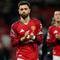 Bruno Fernandes dari Manchester United berjalan keluar lapangan setelah pertandingan Premier League antara Manchester United dan Leeds di Manchester, Inggris, Selasa (14-4-2026) dini hari WIB. (Foto AP/Dave Thompson)