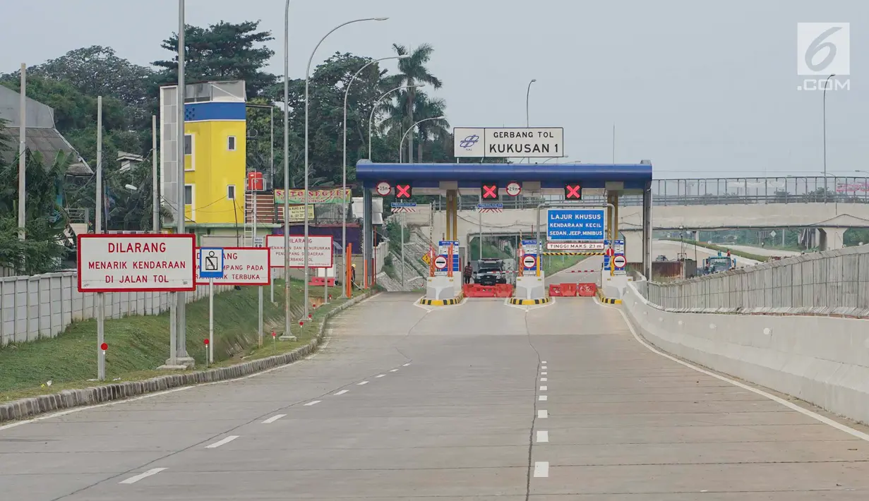 Penampakan Gerbang Tol Kukusan I di Jalan Tol Cijago Seksi II ruas Bogor-Kukusan, Depok, Jawa Barat, Senin (17/6/2019). Setelah sempat diuji coba dua pekan, ruas tol yang nantinya menghubungkan jalur Jagorawi-Cinere tersebut kembali ditutup untuk umum. (Liputan6.com/Immanuel Antonius)