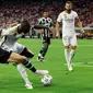 Real Madrid mengalahkan Manchester United dengan skor 2-0. Gol Los Blancos lahir lewat dua pemain anyar mereka, Jude Bellingham dan Joselu. (Tim Warner/Getty Images/AFP)