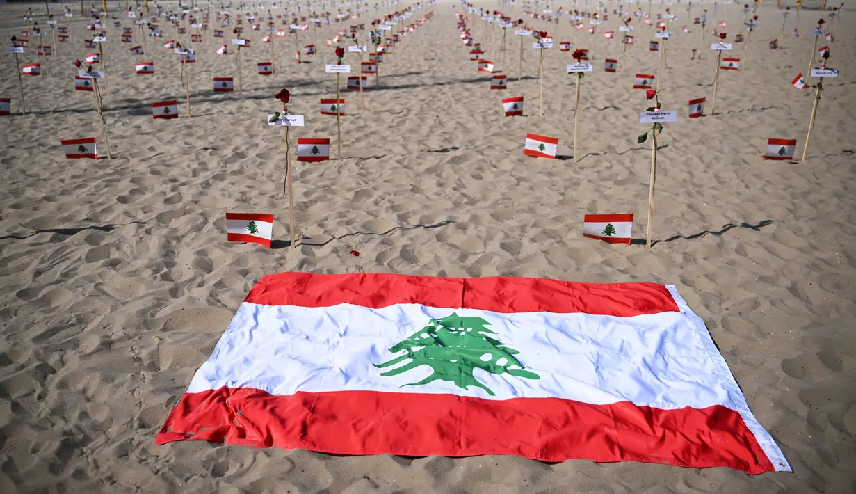 Tiga tahun lalu, pada 4 Agustus 2020, 2.700 ton amonium nitrat, yang disimpan secara tidak benar meledak di sebuah gudang di Pelabuhan Beirut, Lebanon.  (AFP/Carl De Souza)