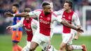 5. Riechedly Bazoer, menurut Daily Minor, Arsenal siap mengakuisisi wonderkid Ajax yang kini masih berusia 19 tahun. Namun untuk mendatangkan pemain berkebangsaan Belanda ini The Gunners harus bersaing dengan Tottenham dan Chelsea. (AFP/Olaf Kraak) 