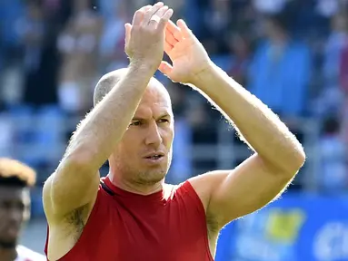 Pemain Bayern Munchen, Arjen Robben diisukan bakal merapat ke Manchester United, menurut Daily Mail, pelatih Jose Mourinho mengnginkan pemain dengan tipikal seperti Robben. (AP/Jens Meyer)