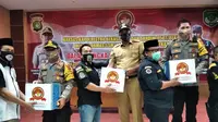 Polres Bekasi bagian bansos untuk anggota ormas (Bam Sinulingga/Liputan6.com)