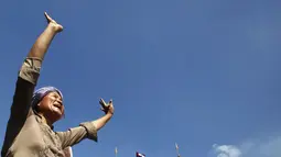 Demonstran menuntut pembebasan 23 pekerja yang ditahan pihak kepolisian sejak 3 Januari lalu, (30/5/2014). (REUTERS/Samrang Pring)